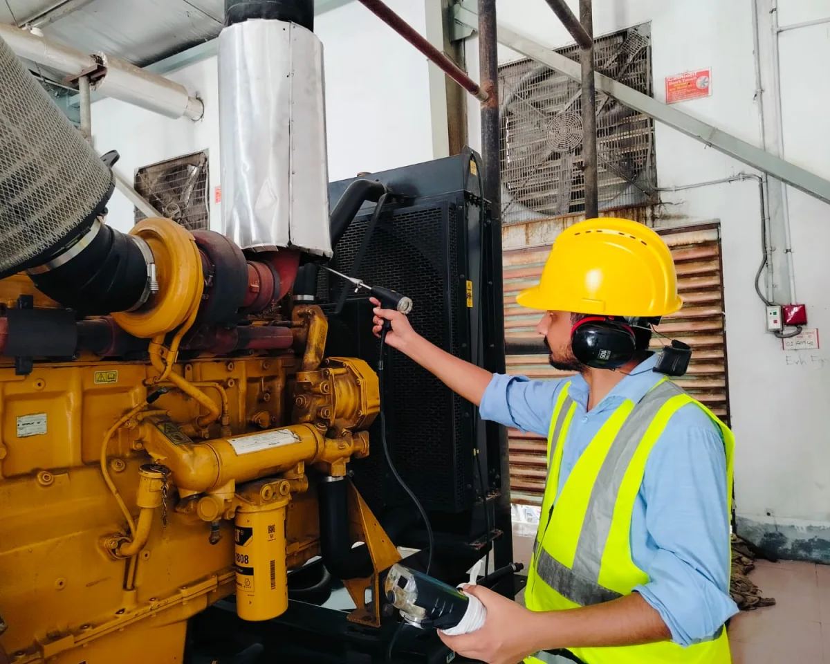 SMS Environmental Alliance specialist carrying out noise and emission monitoring on plant equipment
