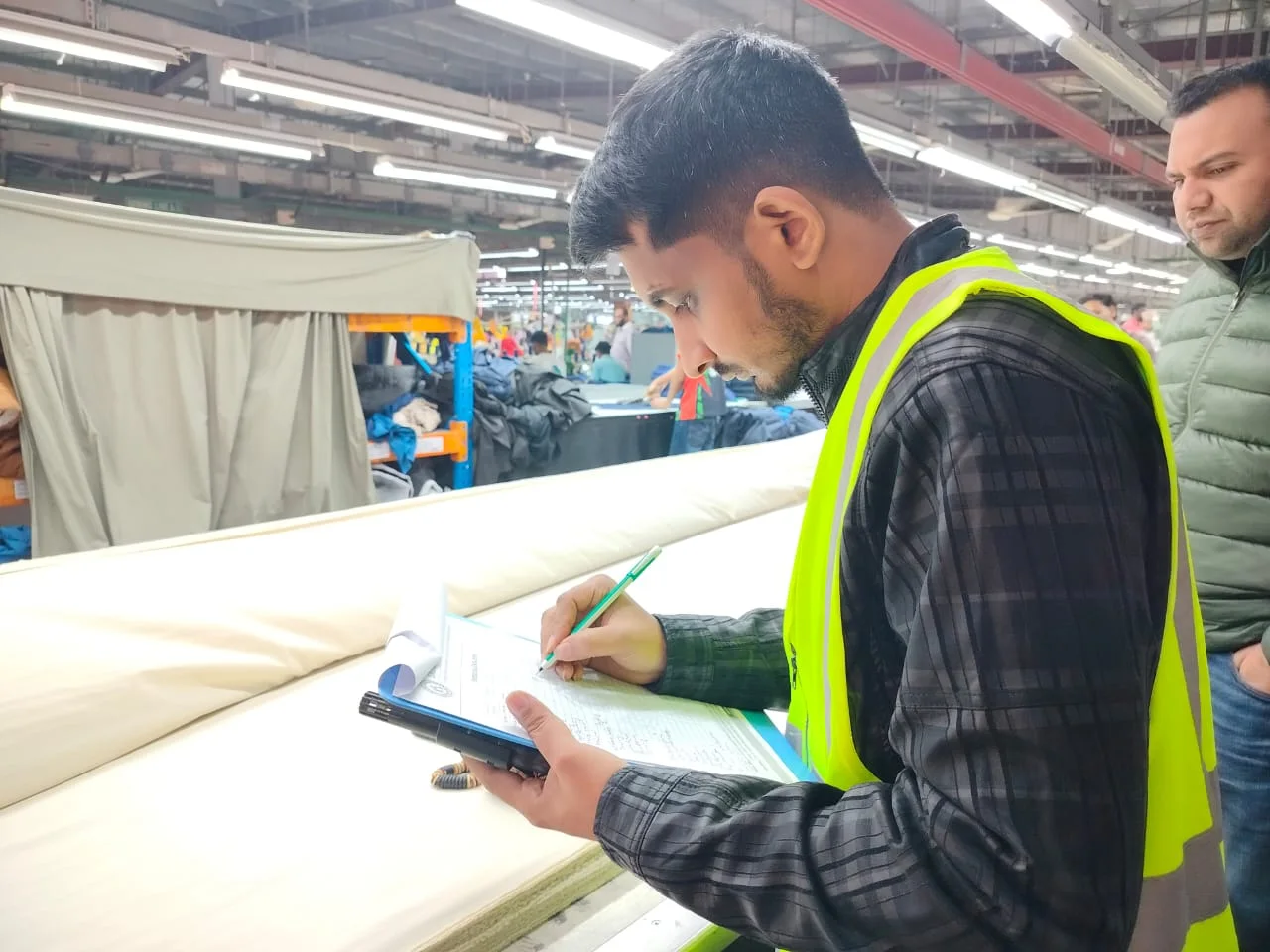 On-site environmental assessment and team briefing at an industrial facility